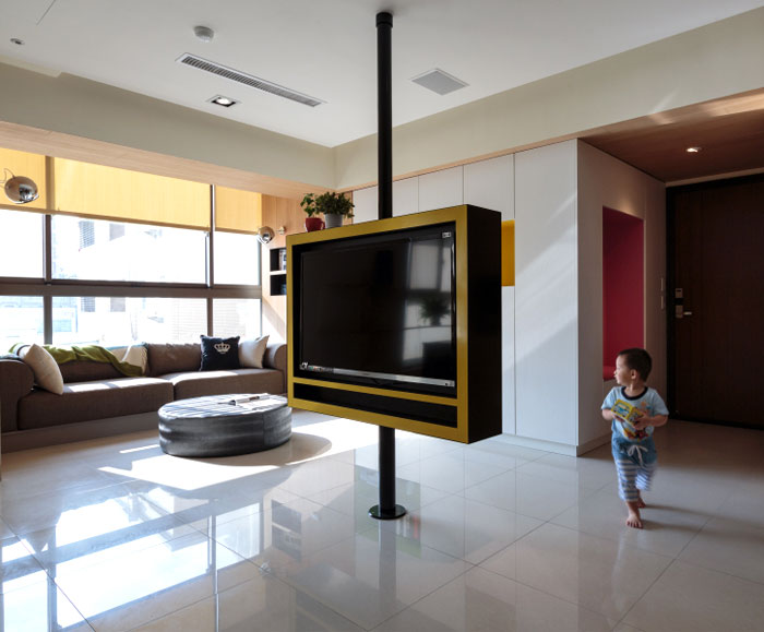 可旋转的电视柜:高雄实用舒适的开放式公寓设计