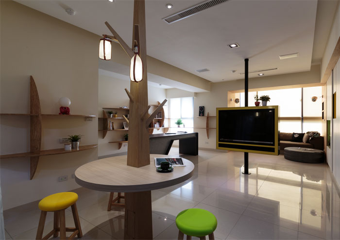 可旋转的电视柜:高雄实用舒适的开放式公寓设计