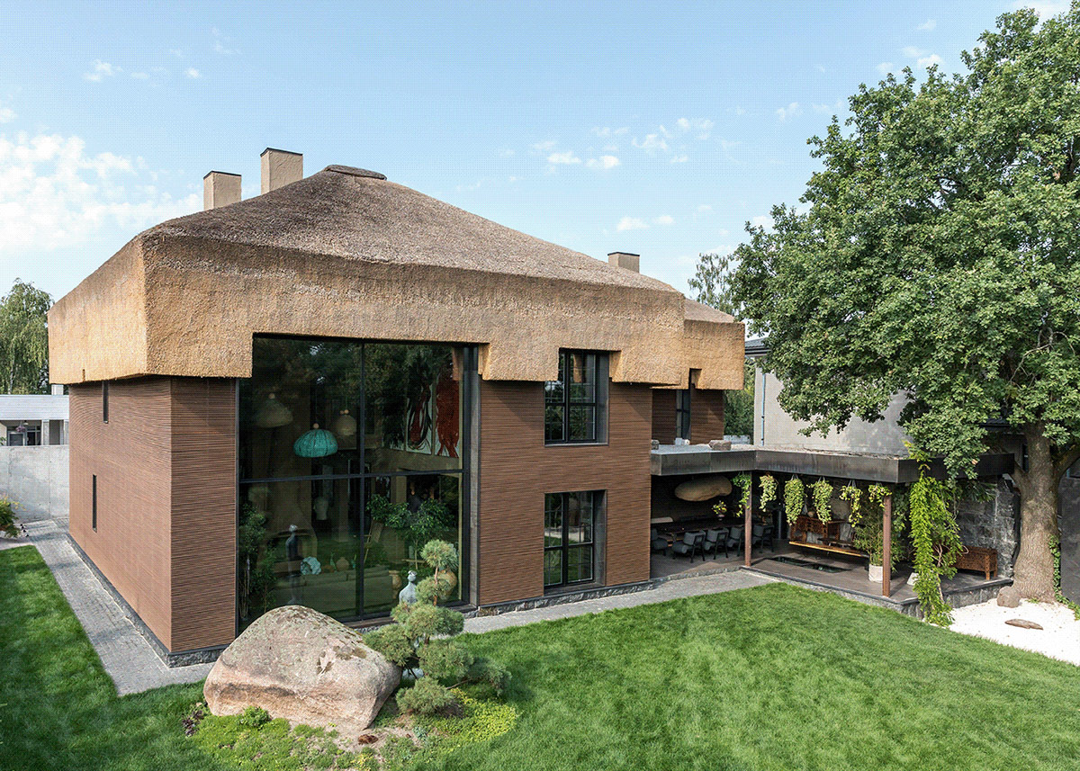 modern-home-with-thatched-roof.j
